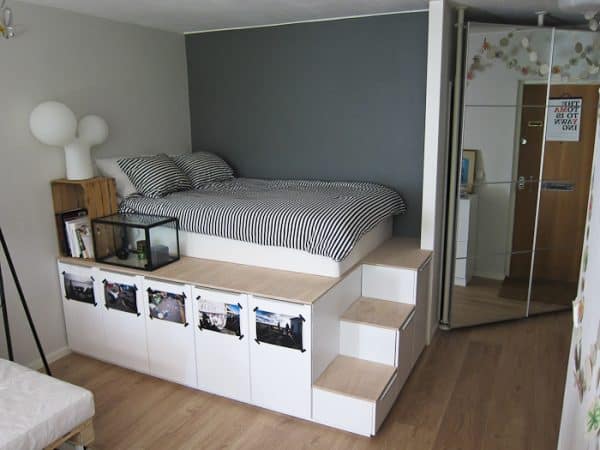 genius bedroom organization ideas- platform bed created out of Ikea cabinets