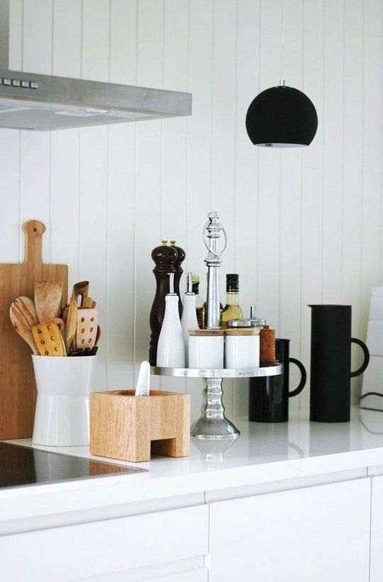aesthetic kitchen counter organization idea featuring contemporary kitchen storage